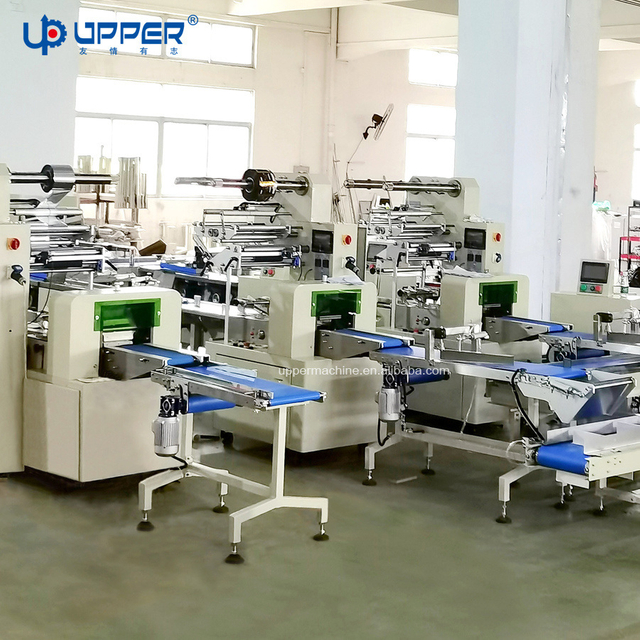 Automatic Wafer Chocolate Small Cup Cake Packaging Machines Energy Bar Whirl Biscuit Cookie Bread Egg Roll Pillow Type up Film Packing Machine Production Line